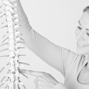 Image of osteopath demonstrating spinal formation at Charlotte Knight's St.James's Surgery