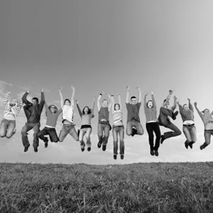 Image of healthy spinal customers jumping with superb posture at Charlotte Knight's St.James's Surgery